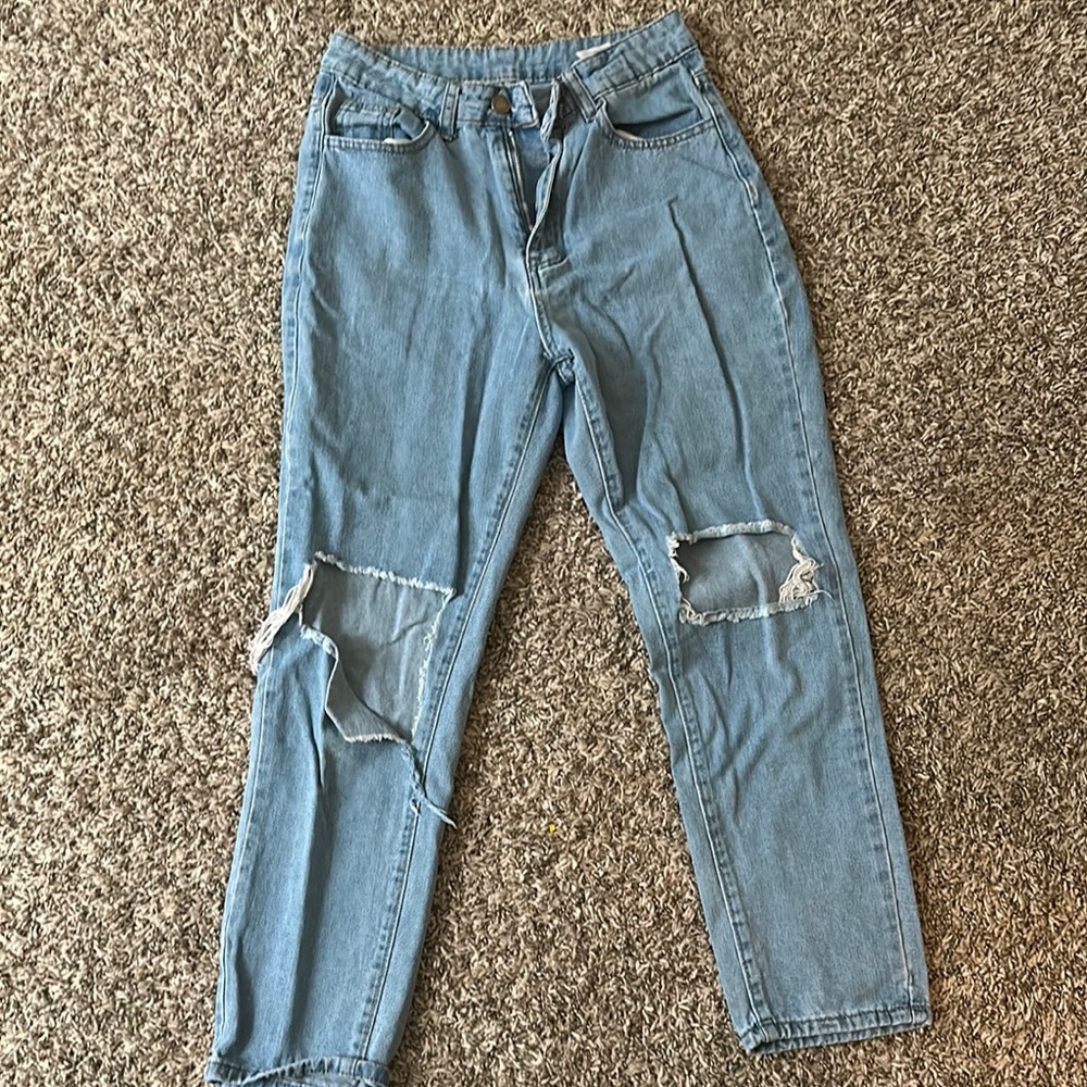 Distressed Blue Denim Jeans